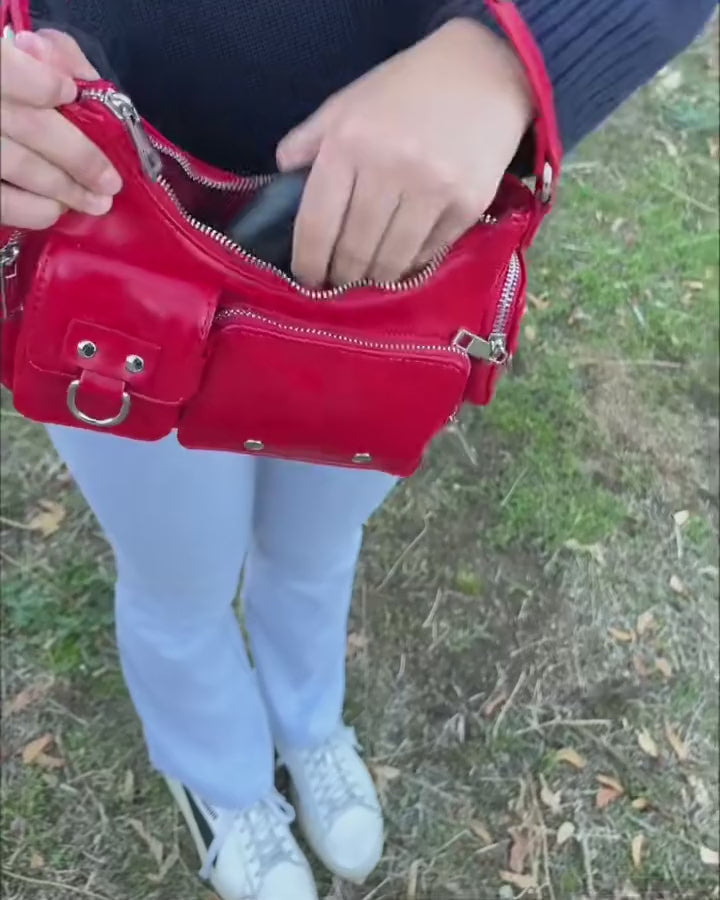 Taking The Mini out of a handbag and opening the lid