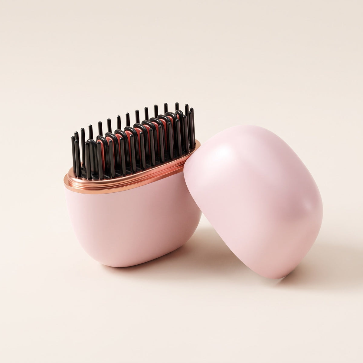 The Velouria™ Mini Straightener in pink, open with its lid beside it